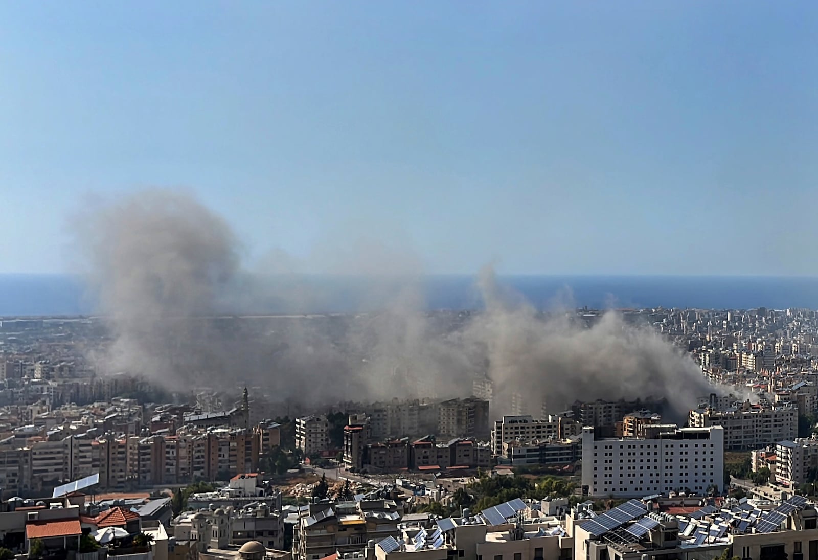 Smoke rises after Israeli airstrikes in Dahiyeh, Beirut, Lebanon, Thursday, Oct. 3, 2024. (AP Photo/Fadi Tawil)