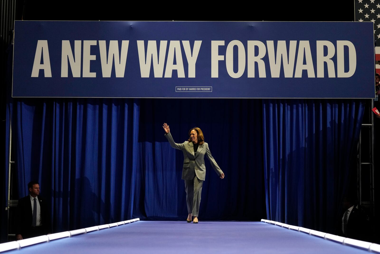 Democratic presidential nominee Vice President Kamala Harris walking on stage for a campaign rally, Friday, Sept. 20, 2024, in Madison, Wis. (AP Photo/Charlie Neibergall)