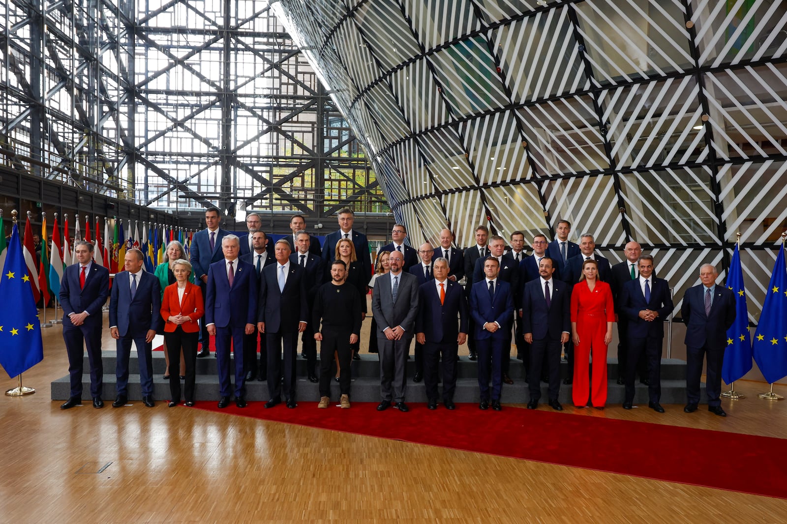 European Union leaders pose for a group photo with Ukraine's President Volodymyr Zelenskyy, front row sixth left, during an EU summit in Brussels, Thursday, Oct. 17, 2024. (AP Photo/Geert Vanden Wijngaert)