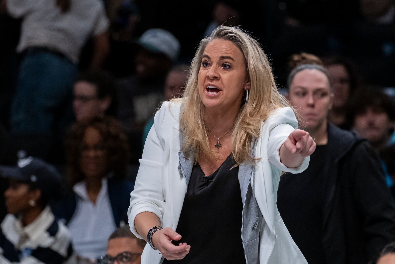 Las Vegas Aces head coach Becky Hammon reacts during the first half of a WNBA basketball second-round playoff game against the New York Liberty, Sunday, Sept. 29, 2024, in New York. (AP Photo/Corey Sipkin)