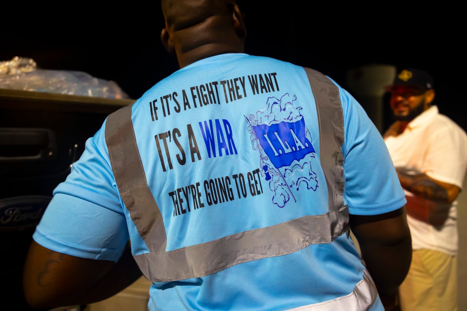 Longshoremen strike at midnight at Bayport Terminal on Tuesday, Oct. 1, 2024, in Houston. (AP Photo/Annie Mulligan)