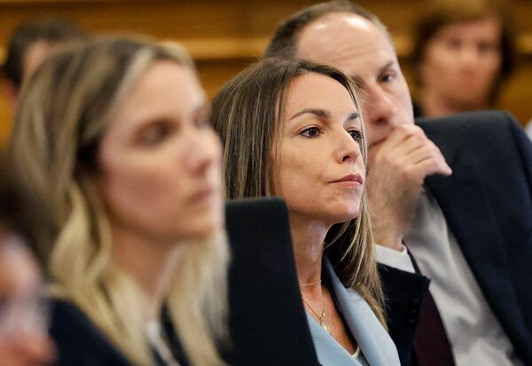 Karen Read listens to testimony by Jennifer McCabe during her murder trail in Norfolk Superior Court in Dedham, Mass., Wednesday, April 30, 2025. (Greg Derr/The Patriot Ledger via AP, Pool)
