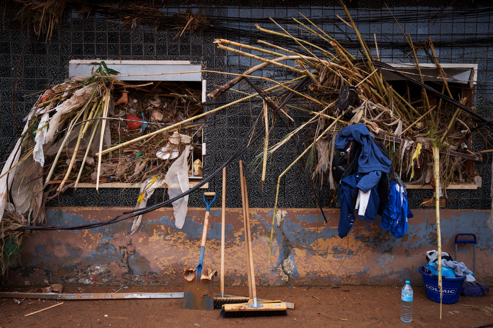 The windows of a house affected by floods are pictured in Valencia, Spain, Saturday, Nov. 2, 2024. (AP Photo/Manu Fernandez)