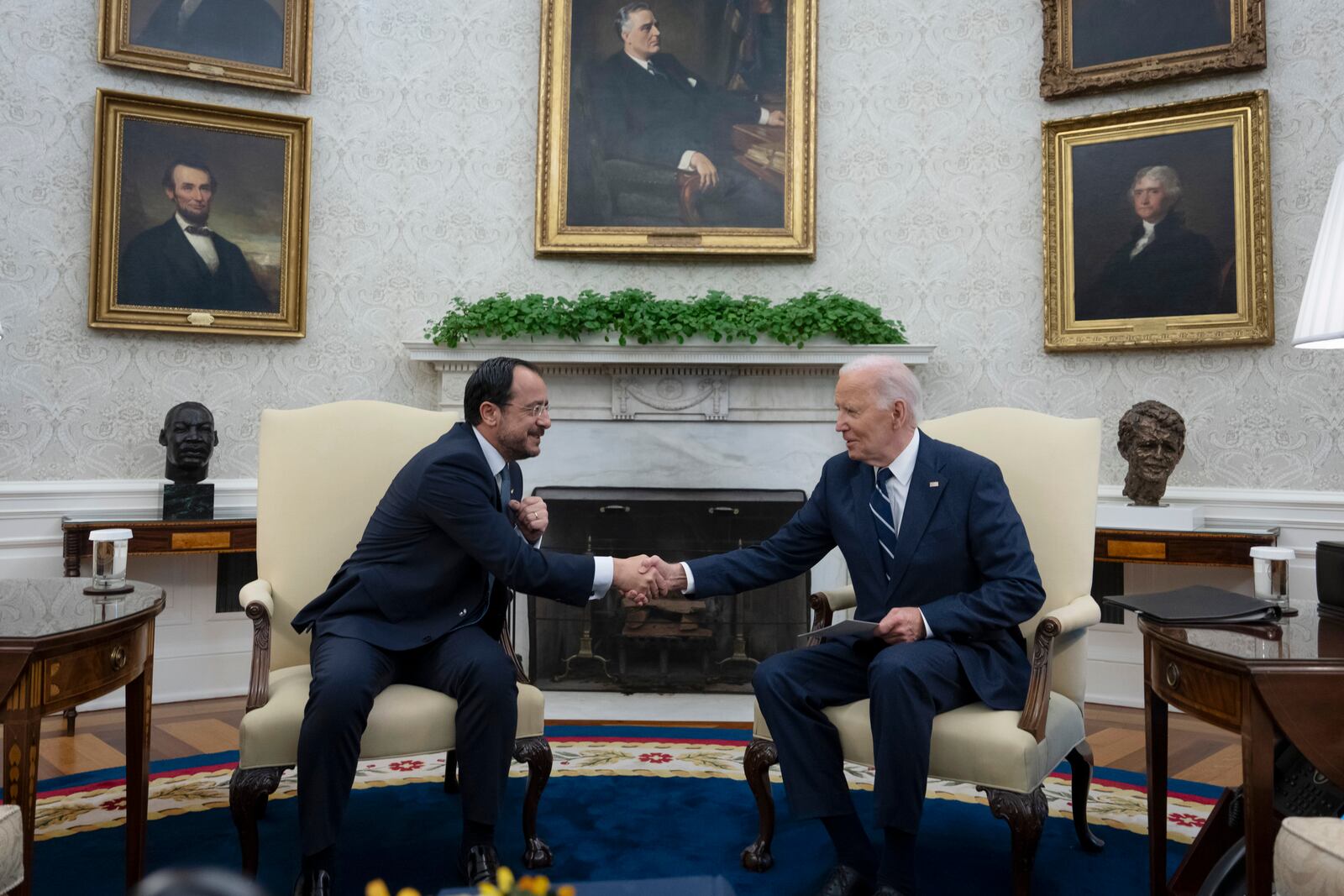 President Joe Biden shakes hands during a meeting with President of Cyprus Nikos Christodoulides, left, in the Oval Office of the White House in Washington, Wednesday, Oct. 30, 2024. (AP Photo/Ben Curtis)