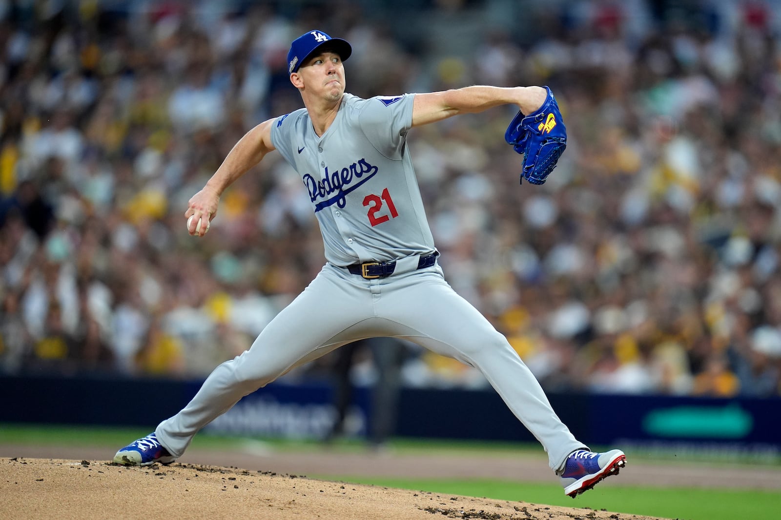 Los Angeles Dodgers pitcher Walker Buehler throws to a San Diego Padres batter during the first inning in Game 3 of a baseball NL Division Series Tuesday, Oct. 8, 2024, in San Diego. (AP Photo/Gregory Bull)