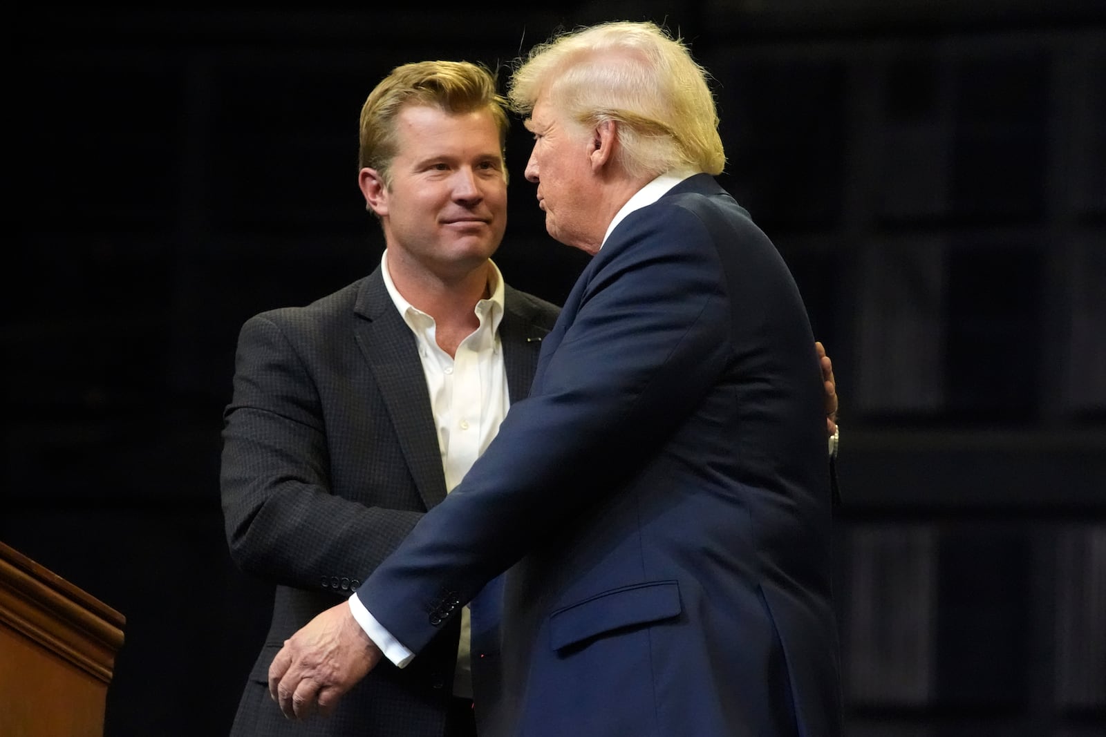 FILE- Republican presidential nominee former President Donald Trump shakes hands with Montana Senate candidate Tim Sheehy at a campaign rally in Bozeman, Mont., Friday, Aug. 9, 2024. (AP Photo/Rick Bowmer, File)