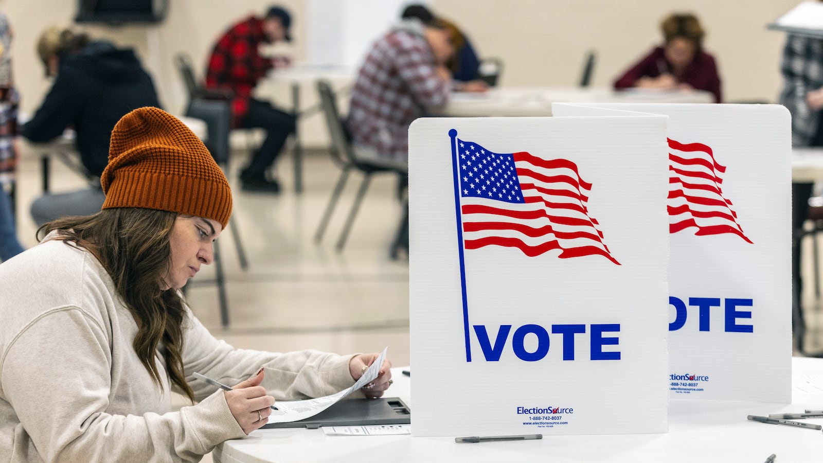 Kortney Test fills out her ballot at Celebration Covenant Church in Omaha, Neb., on Election Day, Tuesday, Nov. 5, 2024. (Chris Machian/Omaha World-Herald via AP)