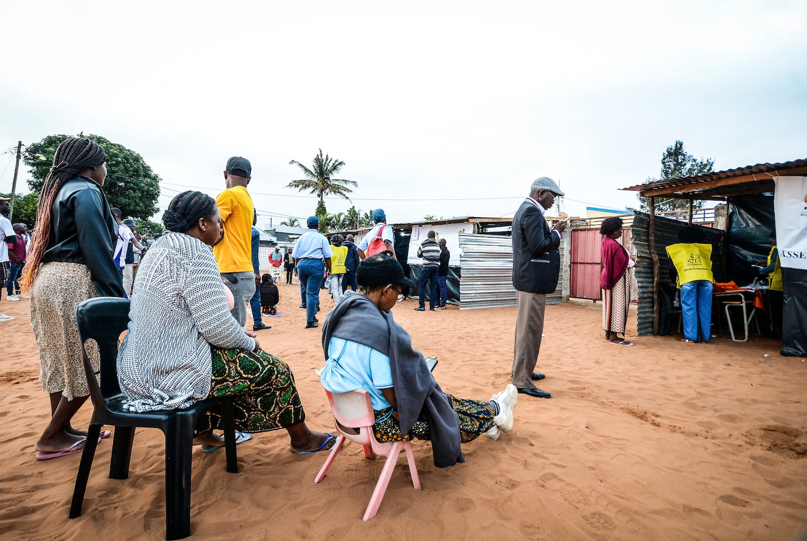 People queue to cast their votes during general elections in Maputo, Mozambique, Wednesday, Oct. 9, 2024. (AP Photo/Carlos Equeio)