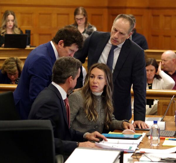Karen Read talks with her attorneys during her trial at Norfolk Superior Court in Dedham, Mass., Friday, May 2, 2025. (Mark Jarret Chavous/The Enterprise via AP, Pool)