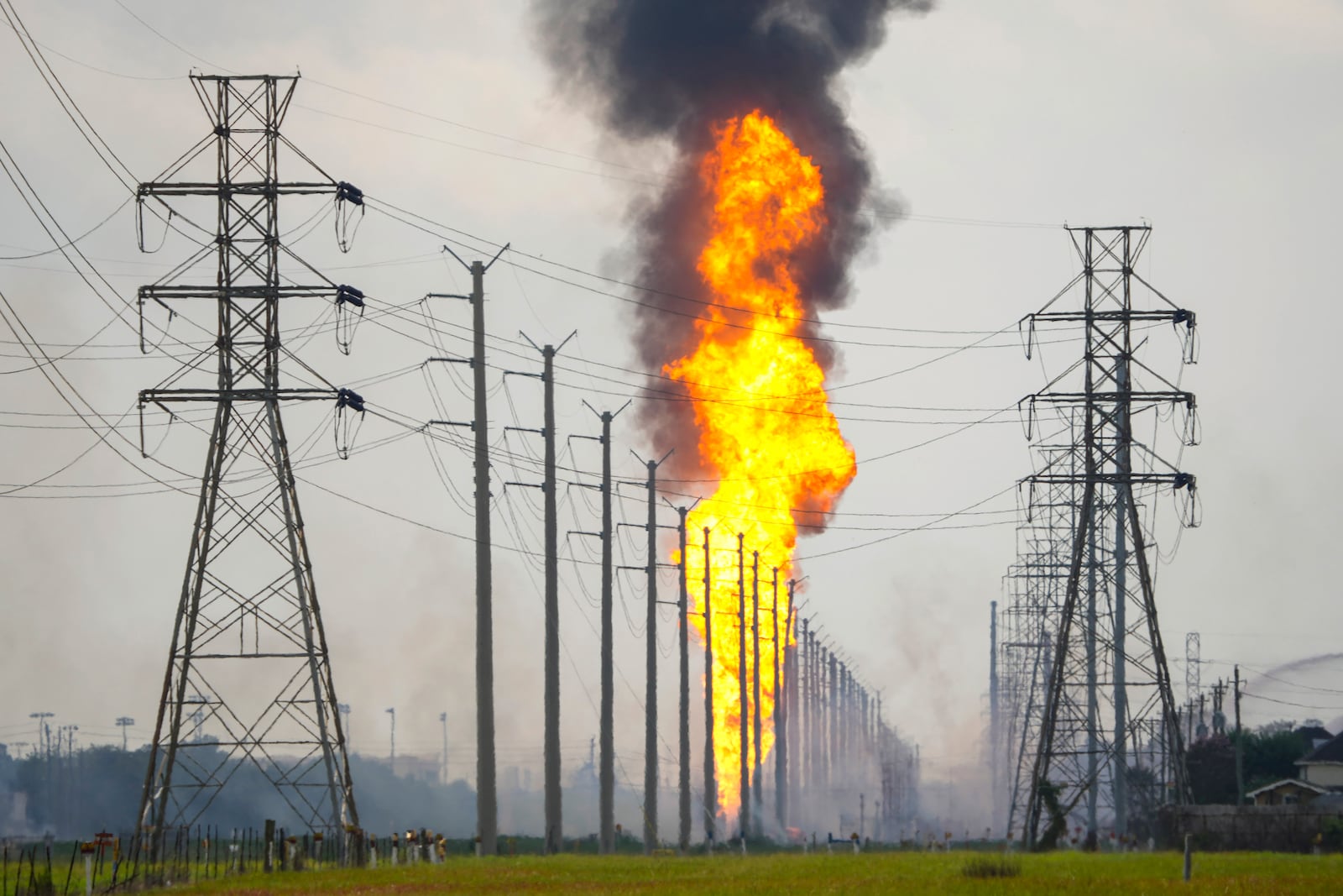 A pipeline with a giant plume of fire burns Monday, Sept. 16, 2024, in La Porte, Texas. (Brett Coomer/Houston Chronicle via AP)