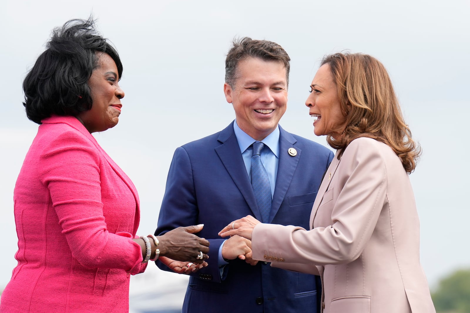 Democratic presidential nominee Vice President Kamala Harris, right, is greeted by Philadelphia Mayor Cherelle Lesley Parker, left, and Rep. Brendan Boyle, D-PA., center, on the tarmac at Atlantic Aviation Philadelphia, Monday, Sept. 9, 2024, near Philadelphia International Airport, in Philadelphia, Tuesday, Sept. 17, 2024. (AP Photo/Jacquelyn Martin)