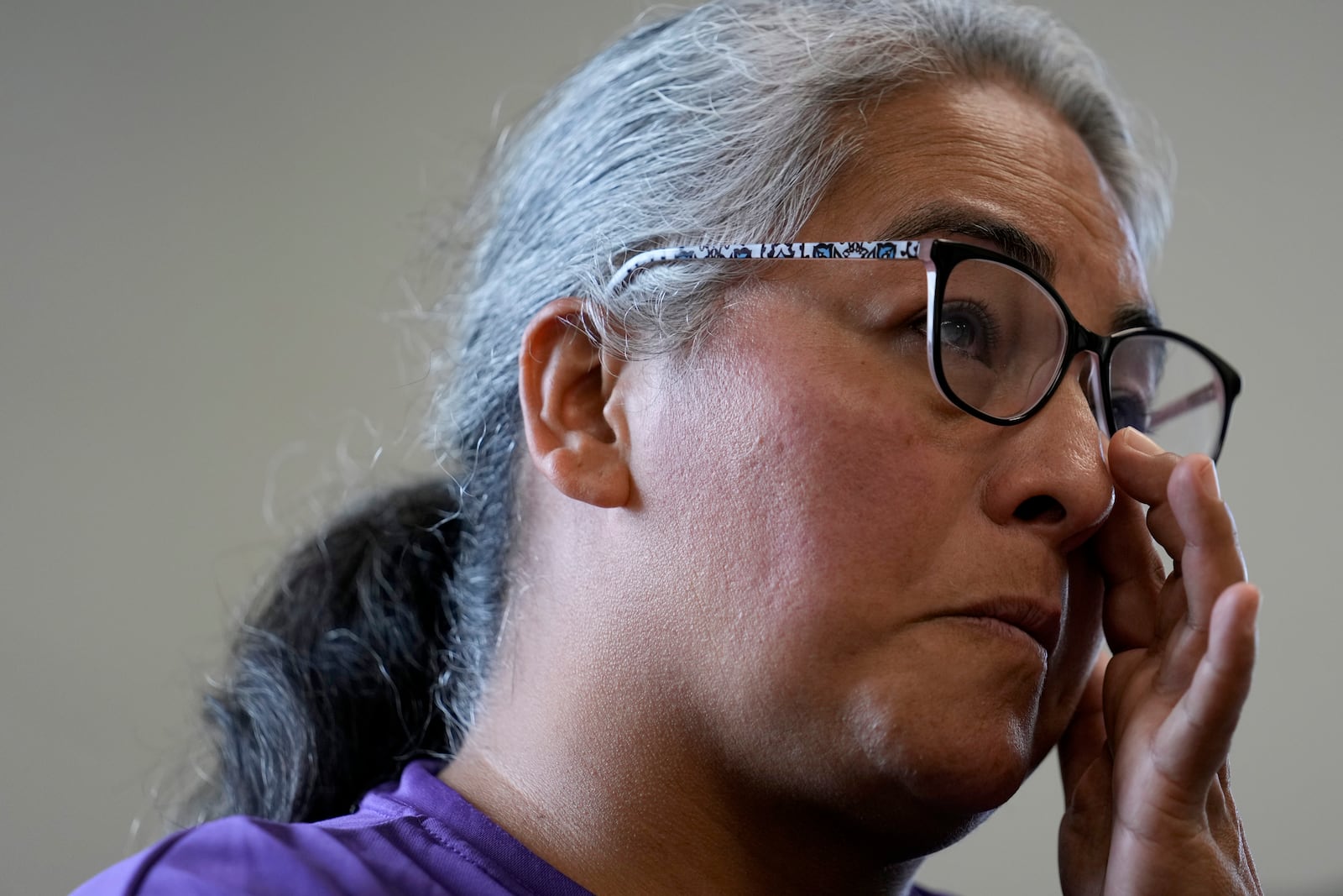 Lorena Reynoso pauses as she speaks about the victims of the Impact Plastics tragedy in the days after Hurricane Helene in Erwin, Tenn., on Thursday, Oct. 3, 2024. (AP Photo/Jeff Roberson)