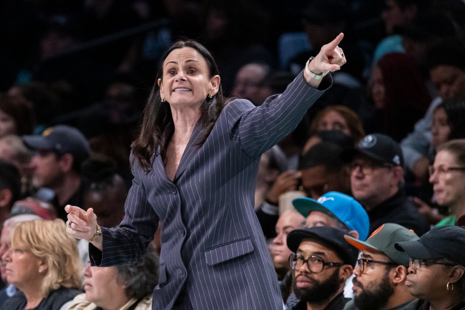 New York Liberty head coach Sandy Brondello reacts during the first half of a WNBA basketball second-round playoff game against the Las Vegas Aces, Sunday, Sept. 29, 2024, in New York. (AP Photo/Corey Sipkin)