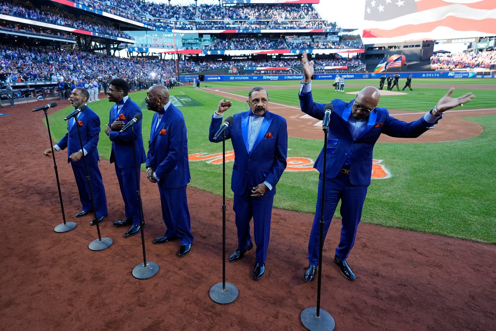 The Temptations perform before Game 5 of a baseball NL Championship Series between the Los Angeles Dodgers and the New York Mets, Friday, Oct. 18, 2024, in New York. (AP Photo/Frank Franklin II)