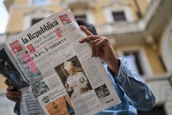 The intelligence-generated image of President Donald Trump dressed as pope fills the front-page of an Italian newspaper in Rome, Sunday, May 4, 2025. (AP Photo/Bernat Armangue)