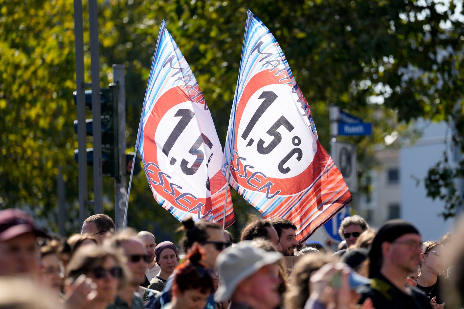 People demonstrate for the the 1.5 Celsius Climate threshold in the City of Bochum, western Germany, as they take part in a Global Climate Strike protest of the Fridays For Future movement on Friday, Sept. 20, 2024. (AP Photo/Martin Meissner)