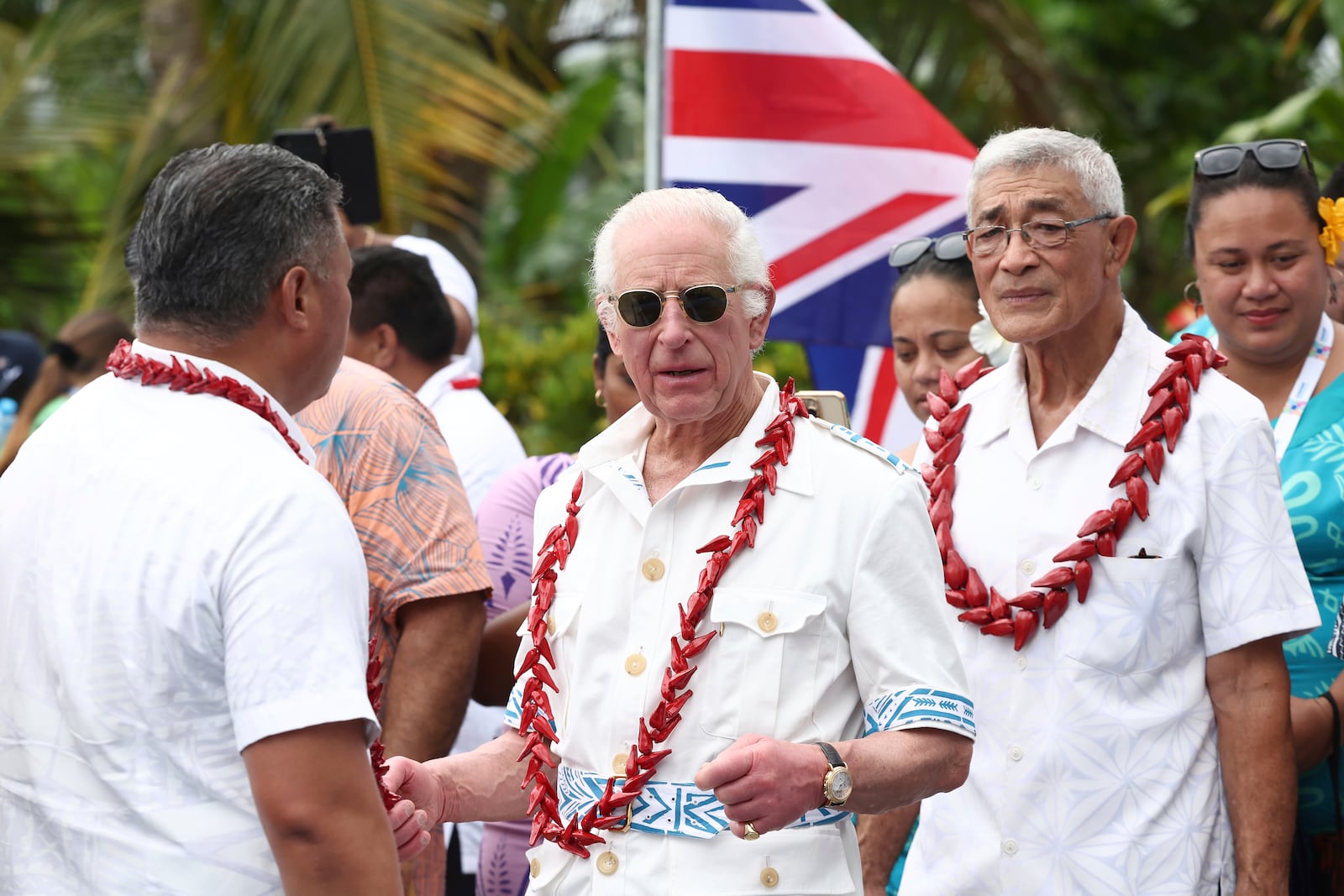 Britain's King Charles III, center, visits the Mangrove Restoration Project at Moata'a Village in Apia, Samoa Thursday, Oct. 24, 2024. (Manaui Faulalo/Pool Photo via AP)