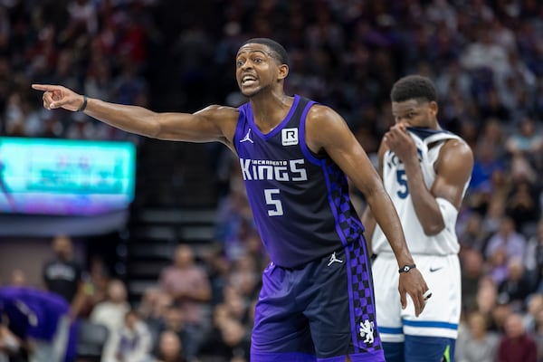 Sacramento Kings guard De'Aaron Fox calls out plays to his team during a free throw shot during the second half of an Emirates NBA Cup basketball game against the Minnesota Timberwolves, Friday, Nov. 15, 2024, in Sacramento, Calif. (AP Photo/Sara Nevis)