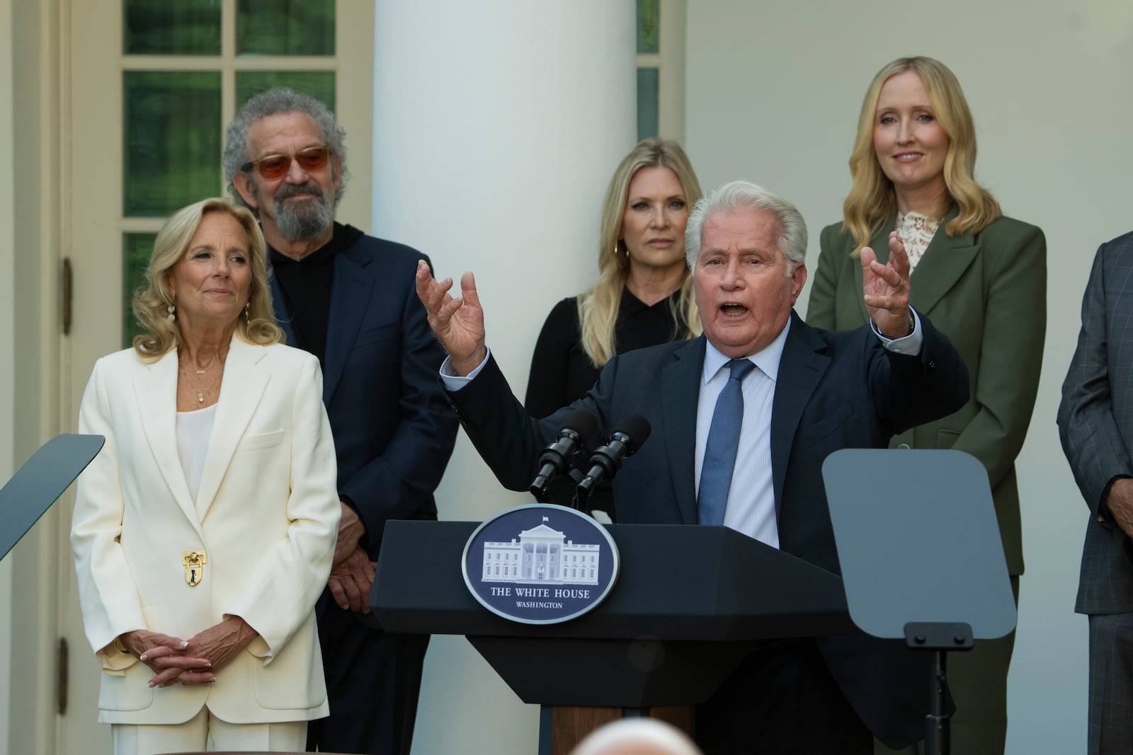 First lady Jill Biden, listens to actor Martin Sheen speaks at an event on the Rose Garden at the White House to mark the 25th anniversary of the television series, The West Wing, Friday, Sept. 20, 2024, in Washington. (AP Photo/Manuel Balce Ceneta)