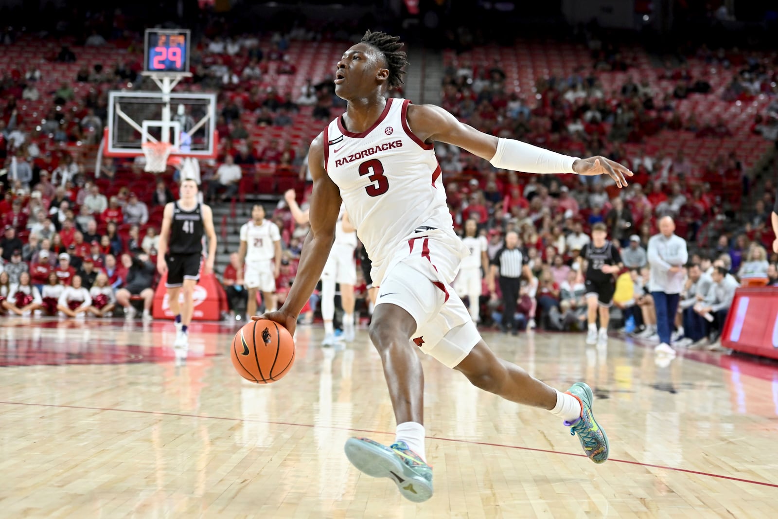 Arkansas forward Adou Thiero (3) drives to the hoop on a fast break against Lipscomb during the second half of an NCAA college basketball game Wednesday, Nov. 6, 2024, in Fayetteville, Ark. (AP Photo/Michael Woods)