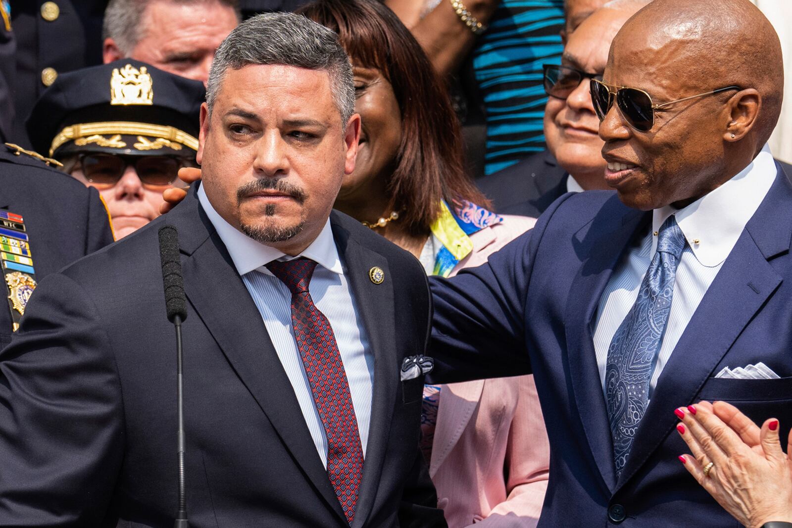 FILE - Edward A. Caban, left, speaks after being sworn in as NYPD police commissioner outside New York City Police Department 40th Precinct, July 17, 2023, in New York. Mayor Eric Adams on the right. (AP Photo/Jeenah Moon, File)