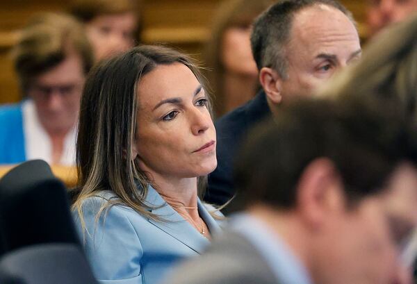 Karen Read listens to the testimony of Jennifer McCabe during her murder trial in Norfolk Superior Court in Dedham, Mass., Wednesday, April 30, 2025. (Greg Derr/The Patriot Ledger via AP, Pool)