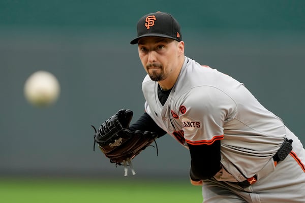 FILE - San Francisco Giants starting pitcher Blake Snell throws during the first inning of a baseball game against the Kansas City Royals, Sept. 22, 2024, in Kansas City, Mo. (AP Photo/Charlie Riedel, File)