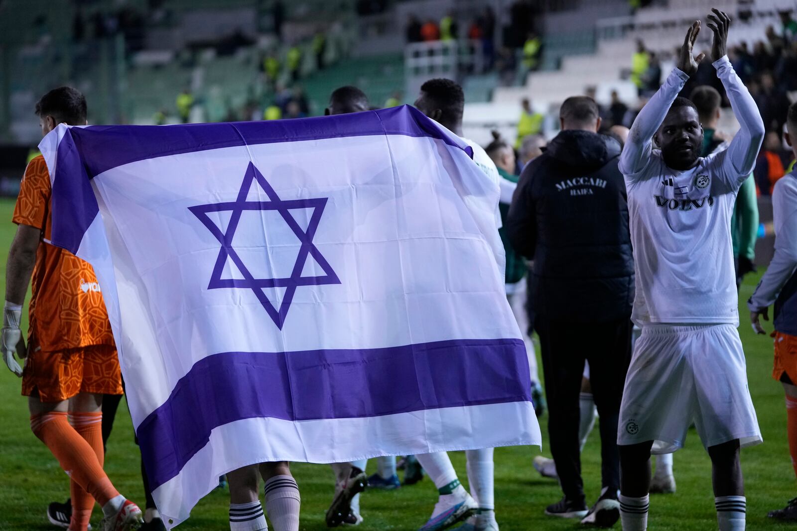 FILE - Maccabi Haifa players celebrate after the Europa League, Group F soccer match, between Panathinaikos and Maccabi Haifa at Apostolos Nikolaidis in Athens, Greece, Thursday, Dec. 14, 2023. Maccabi Haifa won 2-1. (AP Photo/Thanassis Stavrakis, File)