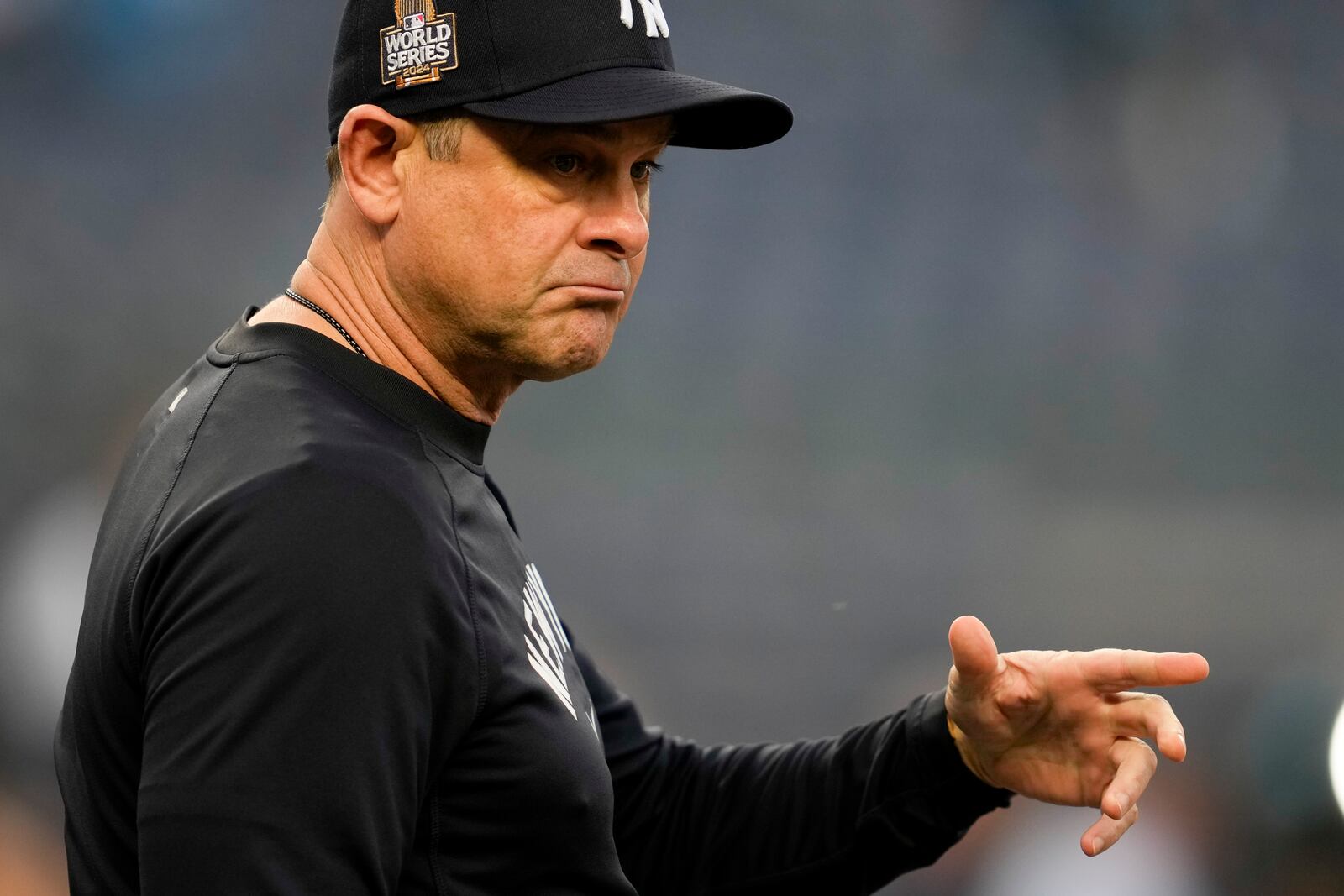 New York Yankees manager Aaron Boone watches during batting practice before Game 5 of the baseball World Series against the Los Angeles Dodgers, Wednesday, Oct. 30, 2024, in New York. (AP Photo/Ashley Landis)