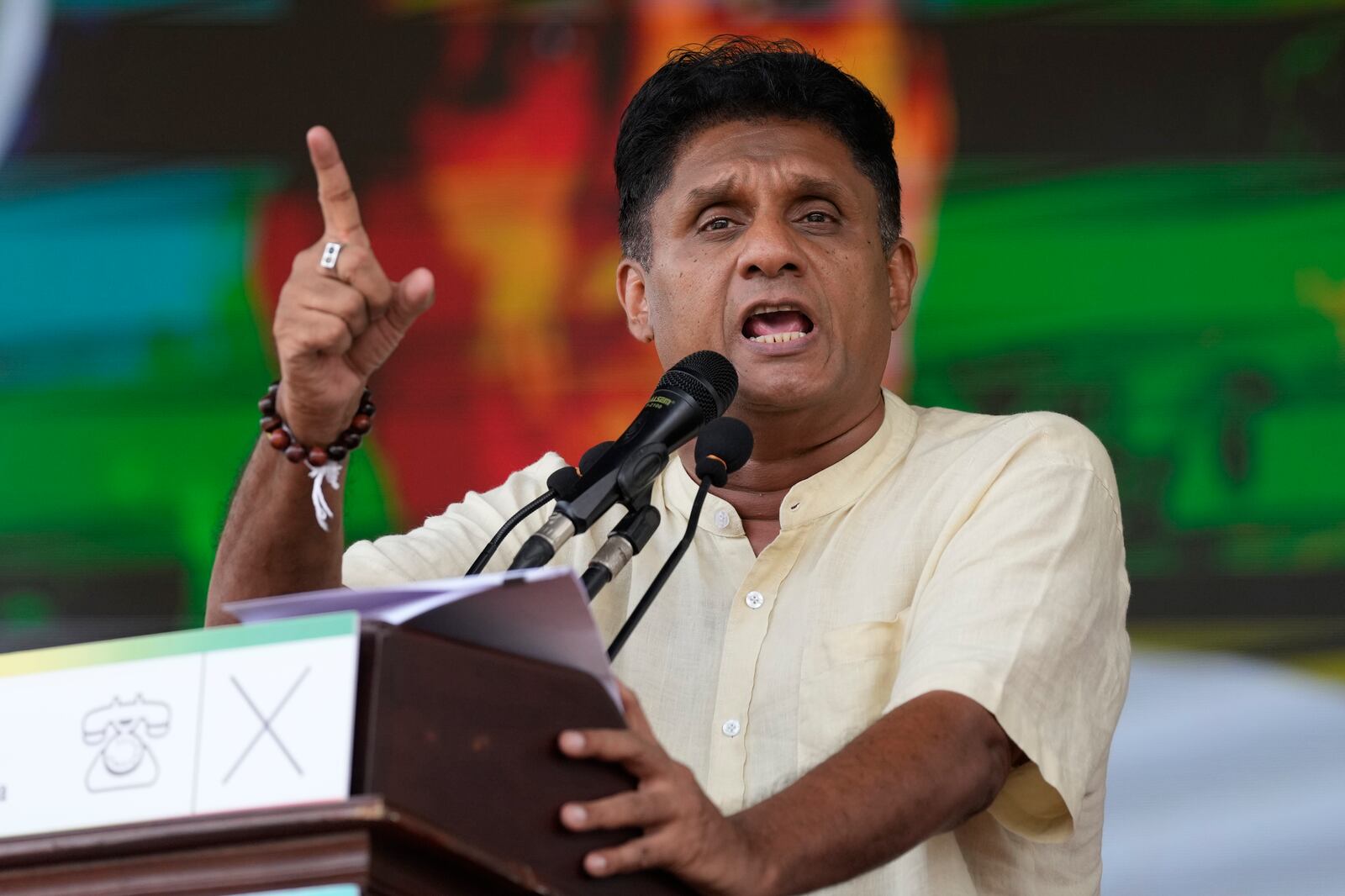 Sri Lanka's opposition leader and presidential candidate Sajith Premadasa speaks to his supporters during a public rally in Thalawakele, Sri Lanka, Sunday, Sept. 8, 2024. (AP Photo/Eranga Jayawardena)