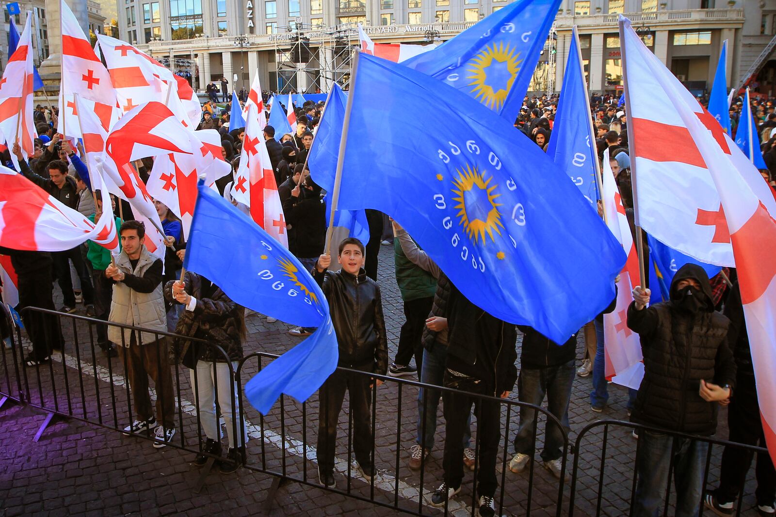 Supporters of the ruling Georgian Dream party attend a rally in the center of Tbilisi, Georgia, Wednesday, Oct. 23, 2024. (AP Photo/Shakh Aivazov)