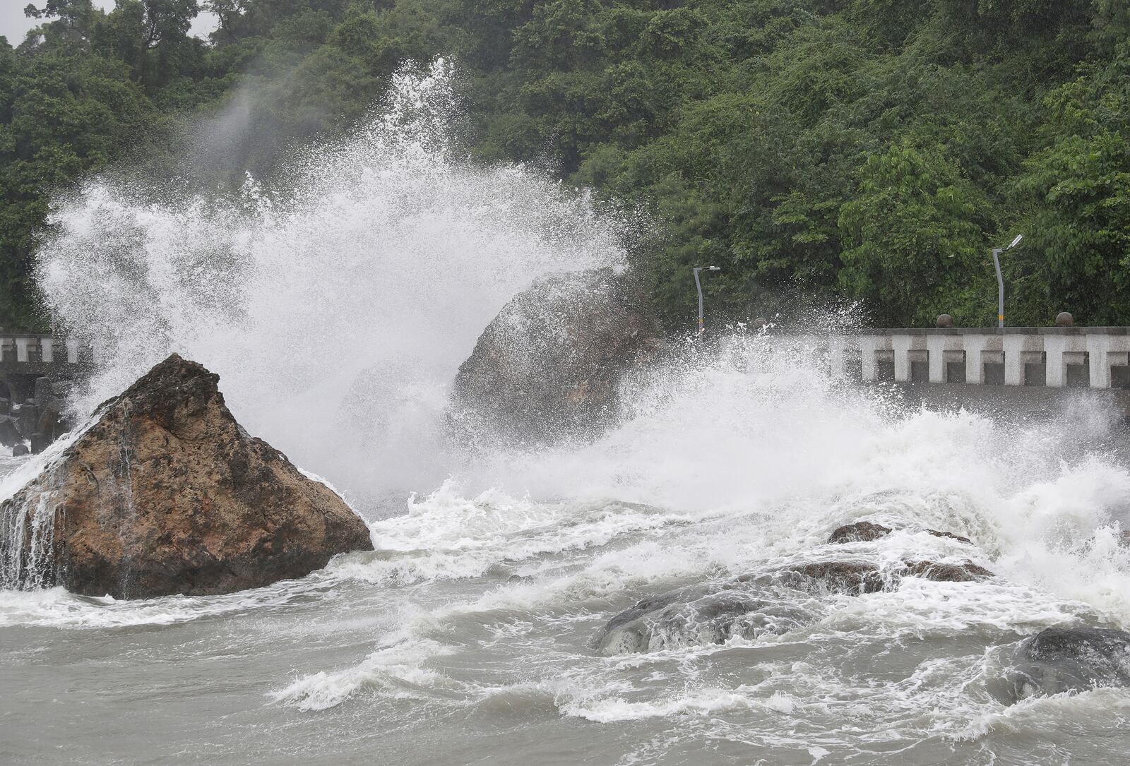 Waves crash onto the coastline of Kaohsiung, southern Taiwan, Wednesday, Oct. 2, 2024, as Typhoon Krathon approaches to Taiwan. (AP Photo/Chiang Ying-ying)