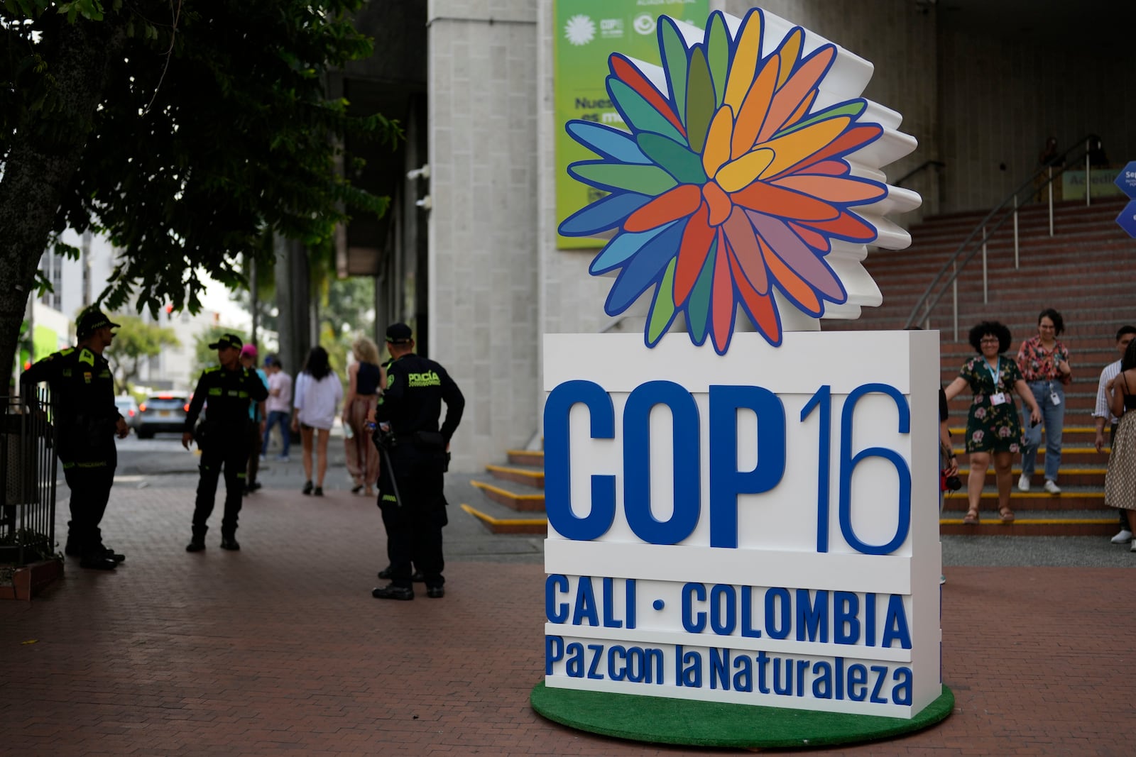 Police stand guard in front of a hotel a day ahead of the COP16 United Nations biodiversity conference, in host city Cali, Colombia, Saturday, Oct. 19, 2024. (AP Photo/Fernando Vergara)