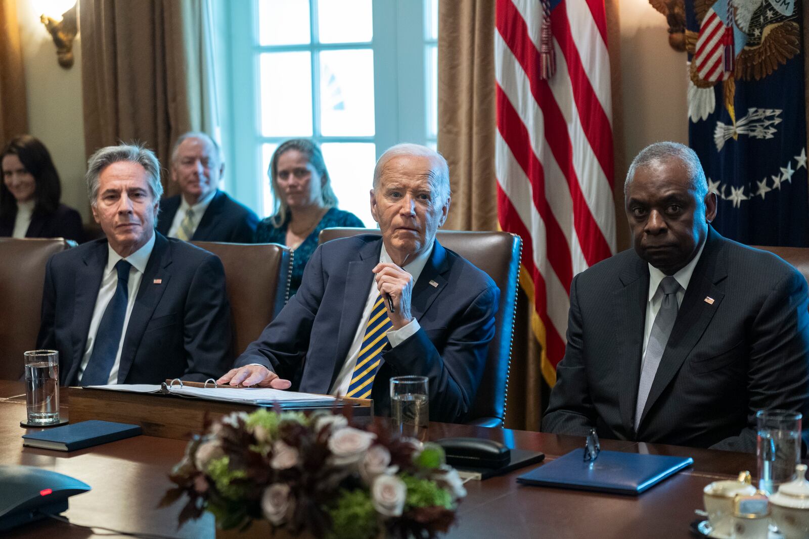 President Joe Biden flanked Secretary of State Antony Blinken, left, and Secretary of Defense Lloyd Austin, right, speaks during a meeting with the members of his cabinet and first lady Jill Biden, in the Cabinet Room of the White House, Friday, Sept. 20, 2024. (AP Photo/Manuel Balce Ceneta)