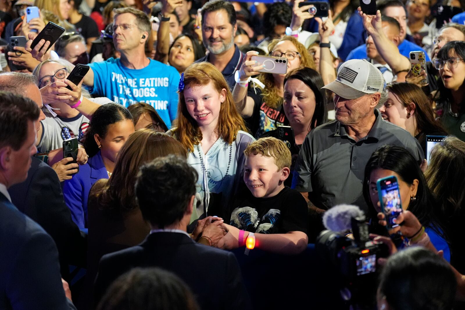 Democratic presidential nominee Vice President Kamala Harris, second from left, greets people in the crowd after speaking at a rally on Sunday, Sept. 29, 2024, in Las Vegas. (AP Photo/Carolyn Kaster)