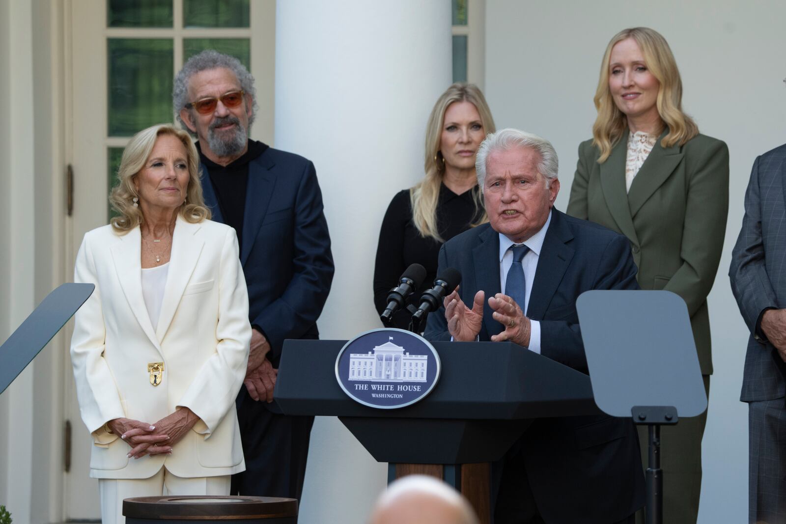 First lady Jill Biden, listens to actor Martin Sheen speaks at an event on the Rose Garden at the White House to mark the 25th anniversary of the television series, The West Wing, Friday, Sept. 20, 2024, in Washington. (AP Photo/Manuel Balce Ceneta)