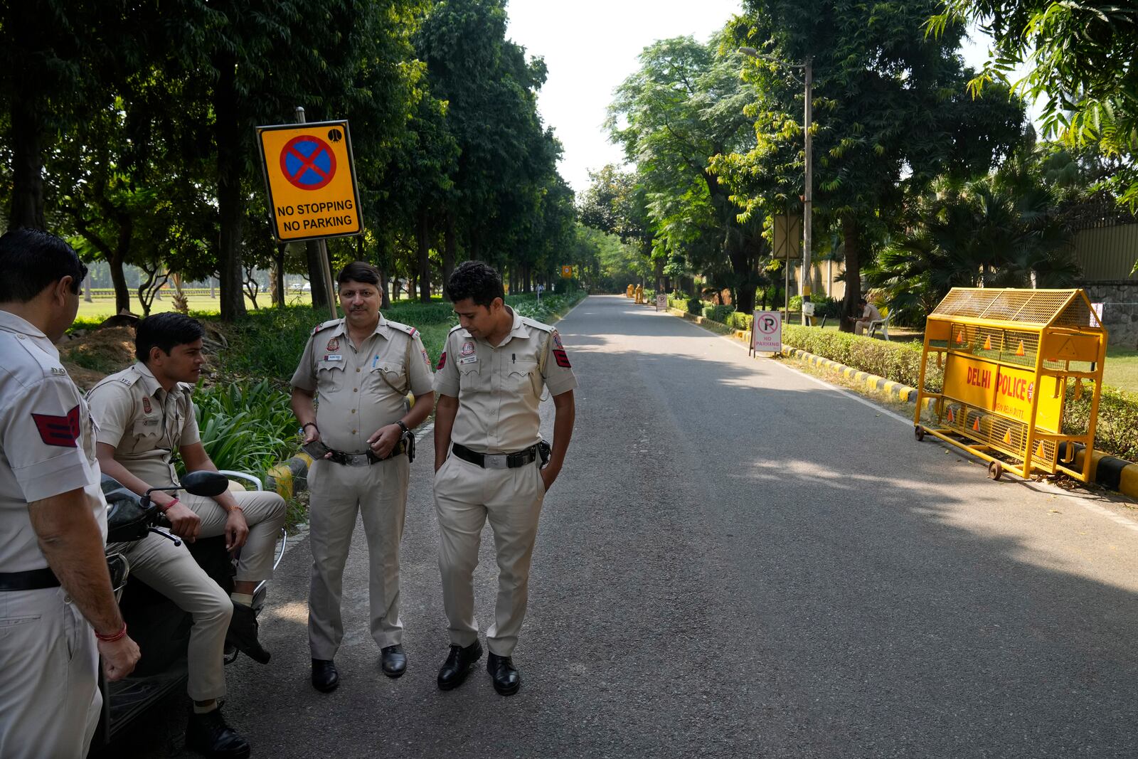 Policemen guard a road leading to the Canadian high commission in New Delhi, India, Tuesday, Oct. 15, 2024 after India and Canada expelled each other’s top diplomats over an ongoing dispute about the killing of a Sikh activist in Canada. (AP Photo/Manish Swarup)