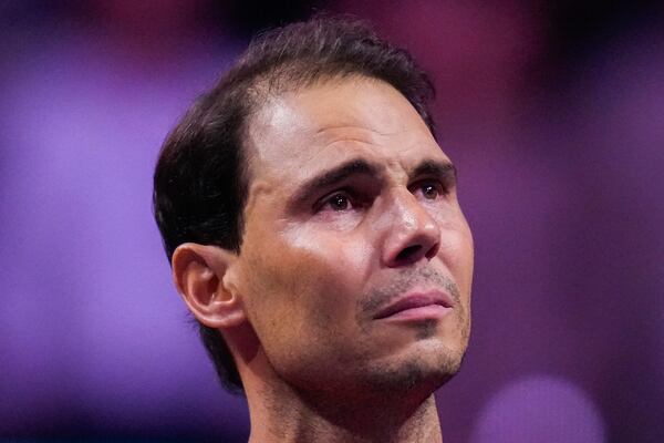 Spain's Rafael Nadal during a tribute after playing his last match as a professional tennis player in the Davis Cup quarterfinals at the Martin Carpena Sports Hall in Malaga, southern Spain, on early Wednesday, Nov. 20, 2024. (AP Photo/Manu Fernandez)