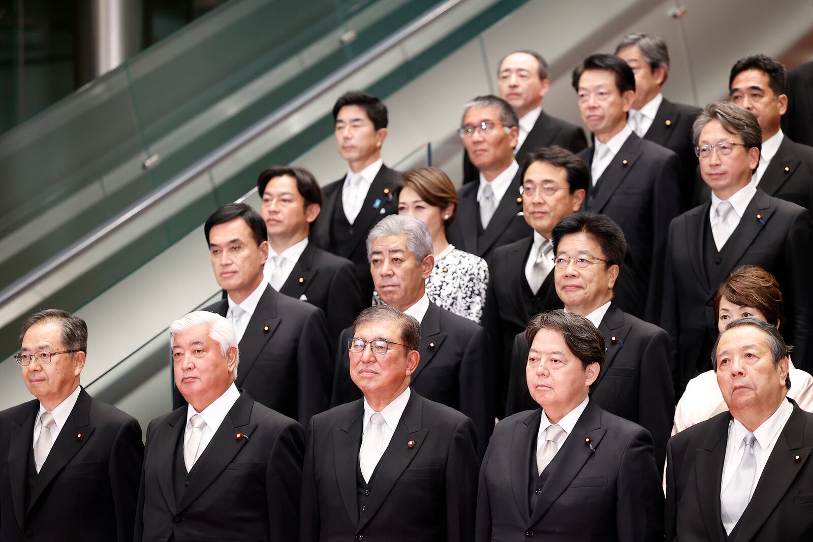 Japan's Prime Minister Shigeru Ishiba, third from right, and his cabinet ministers pose for a photo session at Ishiba's residence in Tokyo, Japan, Tuesday, Oct. 1, 2024. Rodrigo Reyes Marin, Pool Photo via AP)