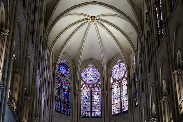 Windows in the heart of Notre-Dame de Paris cathedral are seen while French President Emmanuel Macron visits the restored interiors of the monument, Friday Nov. 29, 2024, in Paris. (Stephane de Sakutin, Pool via AP)