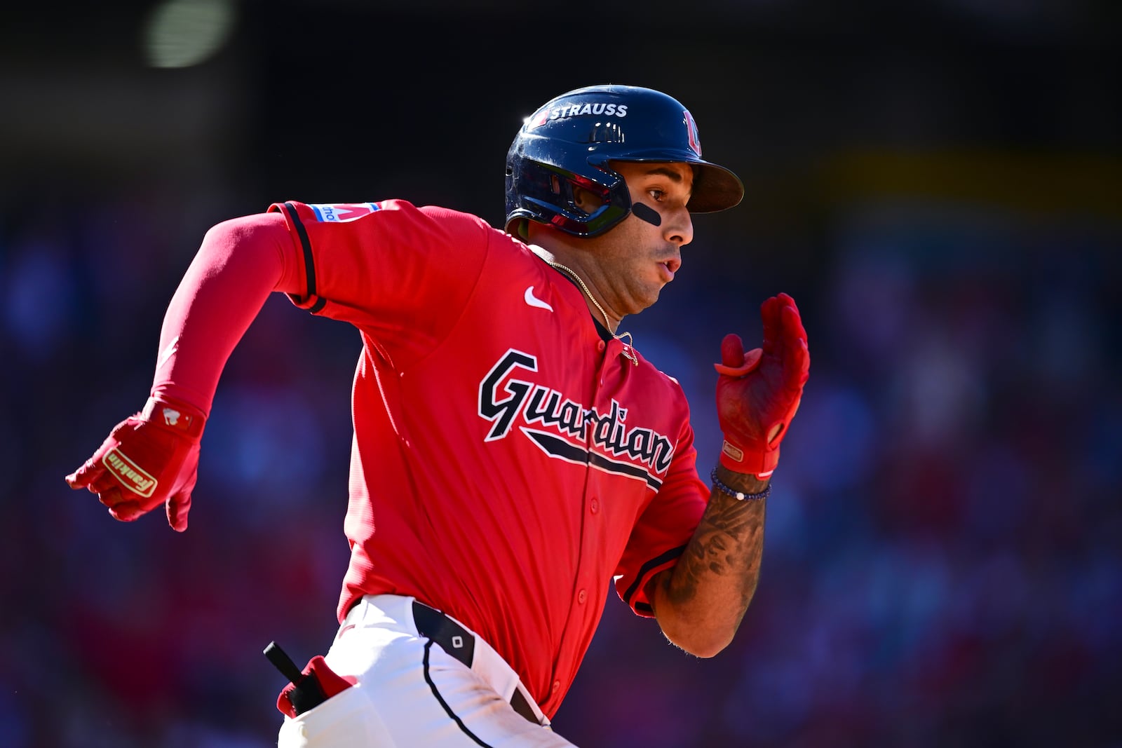 Cleveland Guardians' Brayan Rocchio runs to second base with a double in the eighth inning during Game 1 of baseball's AL Division Series against the Detroit Tigers, Saturday, Oct. 5, 2024, in Cleveland. (AP Photo/David Dermer)