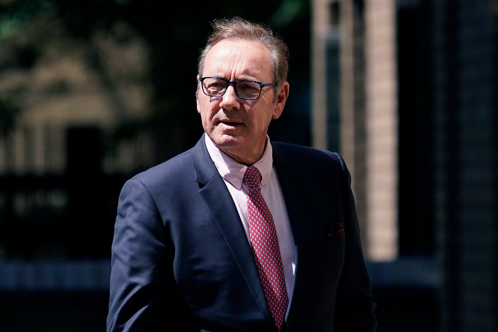 FILE - Actor Kevin Spacey walks outside Southwark Crown Court in London, July 26, 2023. (AP Photo/Alberto Pezzali, File)