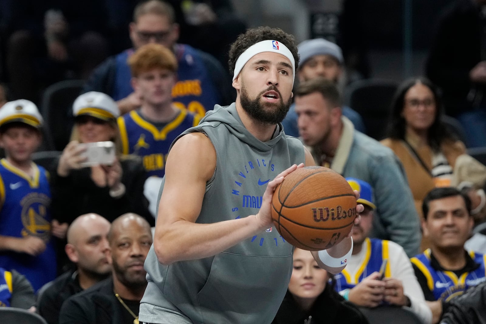 Dallas Mavericks guard Klay Thompson warms up before an Emirates NBA Cup basketball game against the Golden State Warriors in San Francisco, Tuesday, Nov. 12, 2024. (AP Photo/Jeff Chiu)