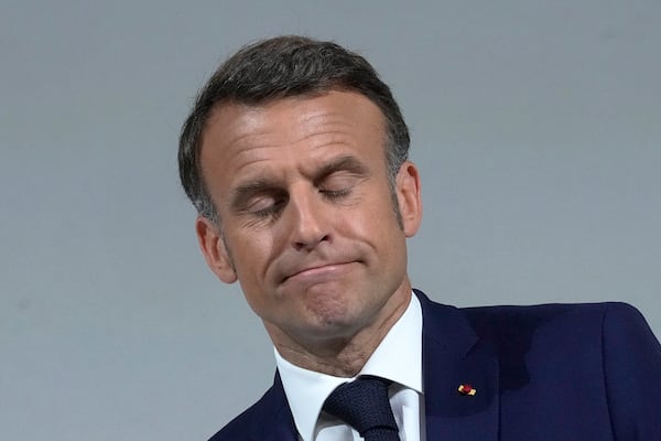 FILE - French President Emmanuel Macron reacts as he delivers a speech, Wednesday, June 12, 2024 in Paris. (AP Photo/Michel Euler, file)