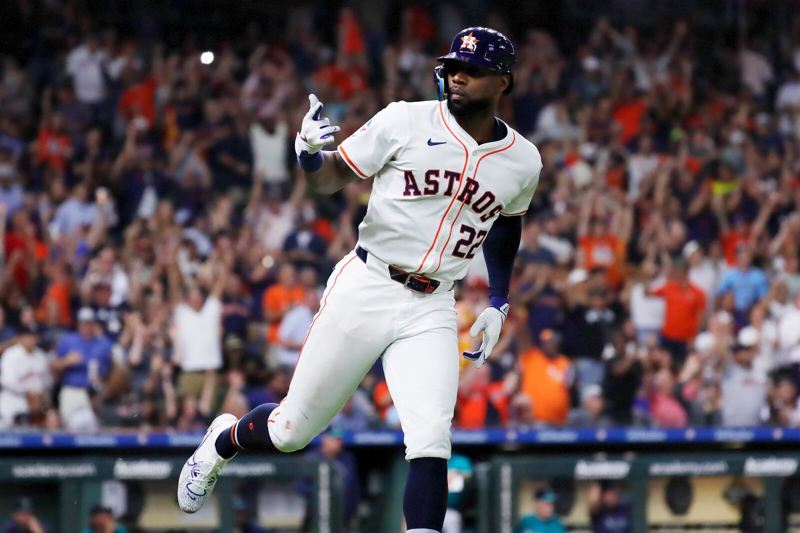 Houston Astros' Jason Heyward gestures to the dugout as he rounds the bases on his two-run home run against the Seattle Mariners during the fifth inning of a baseball game Tuesday, Sept. 24, 2024, in Houston. (AP Photo/Michael Wyke)