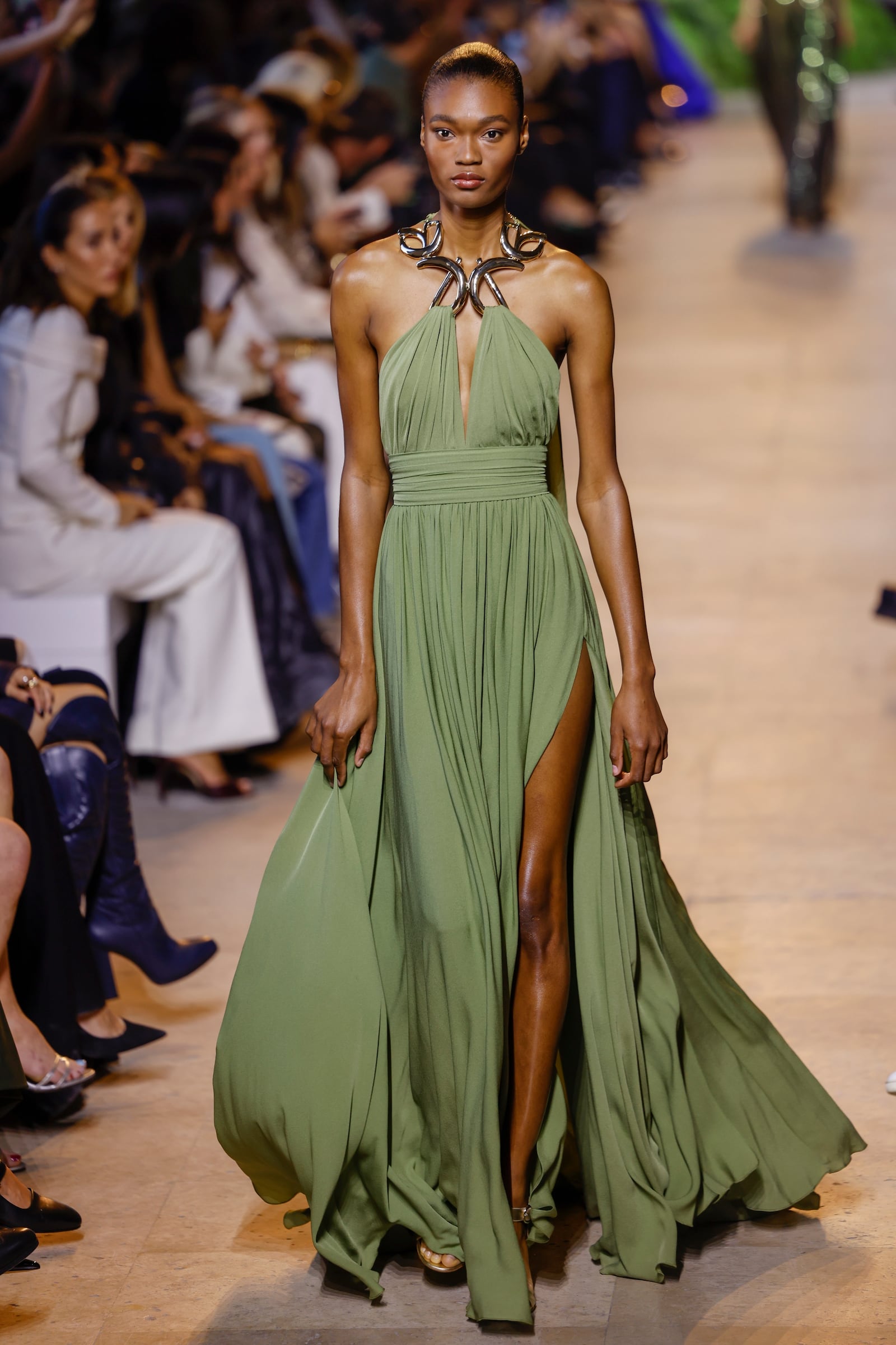 A model wears a creation as part of the Elie Saab Spring/Summer 2025 collection presented Saturday, Sept. 28, 2024, in Paris. (Photo by Vianney Le Caer/Invision/AP)