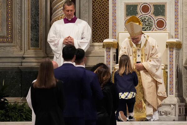 Pope Leo XIV presides over a Mass in the Archbasilica of St. John Lateran and takes possession of the Roman Cathedra, formalizing his role as Bishop of Rome in Rome, Sunday, May 25, 2025. (AP Photo/Gregorio Borgia)