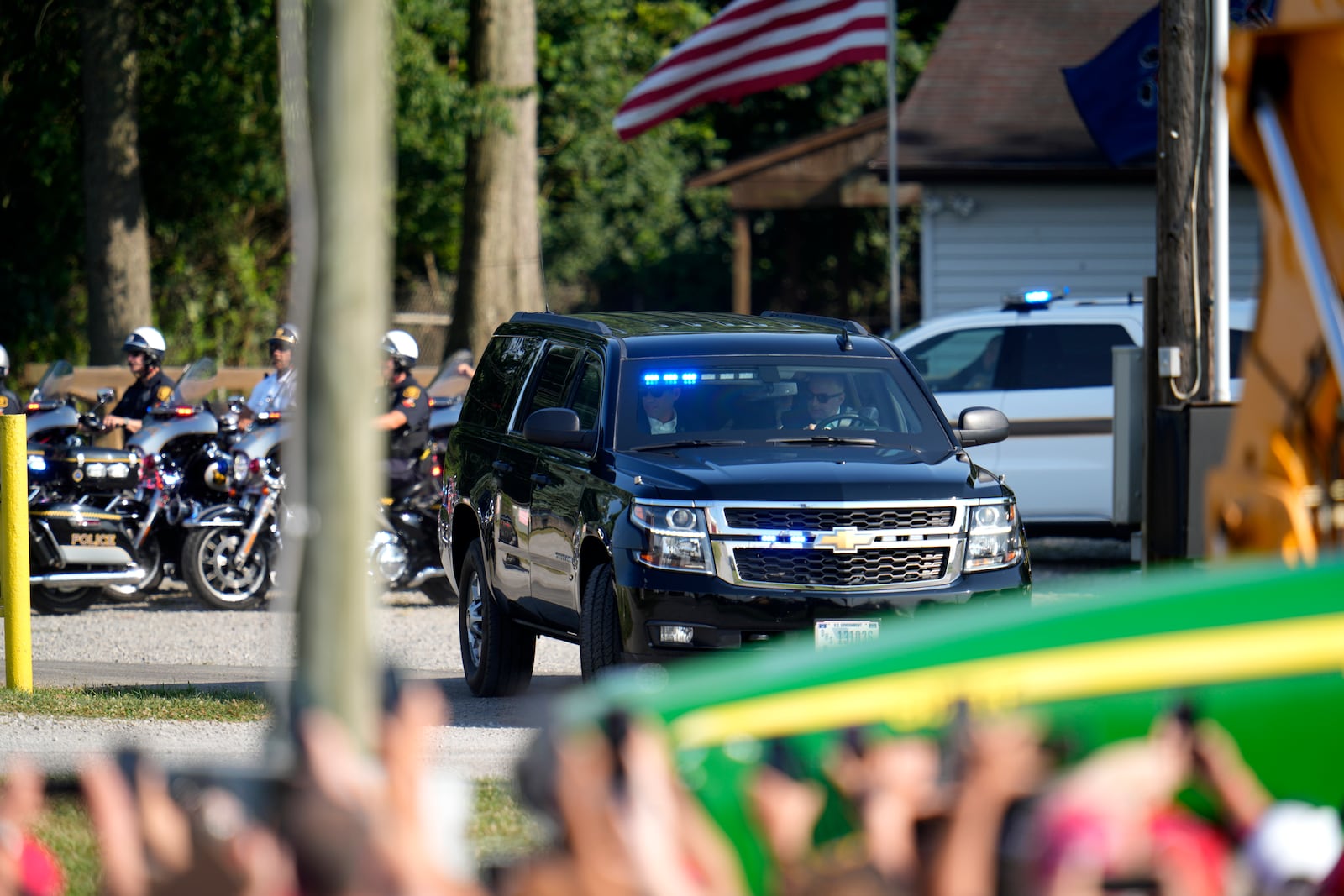 FILE - A motorcade with Republican presidential candidate former President Donald Trump arrives at a campaign event in Butler, Pa., July 13, 2024. (AP Photo/Gene J. Puskar, File)