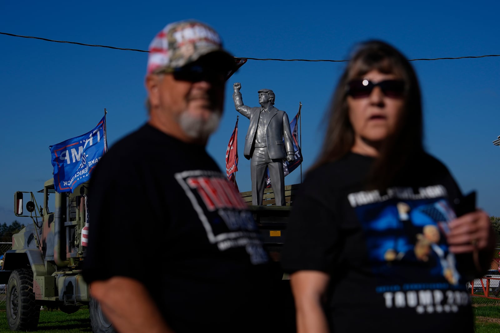 Supporters arrive before Republican presidential nominee former President Donald Trump speaks at a campaign rally at the Butler Farm Show, Saturday, Oct. 5, 2024, in Butler, Pa. (AP Photo/Julia Demaree Nikhinson)