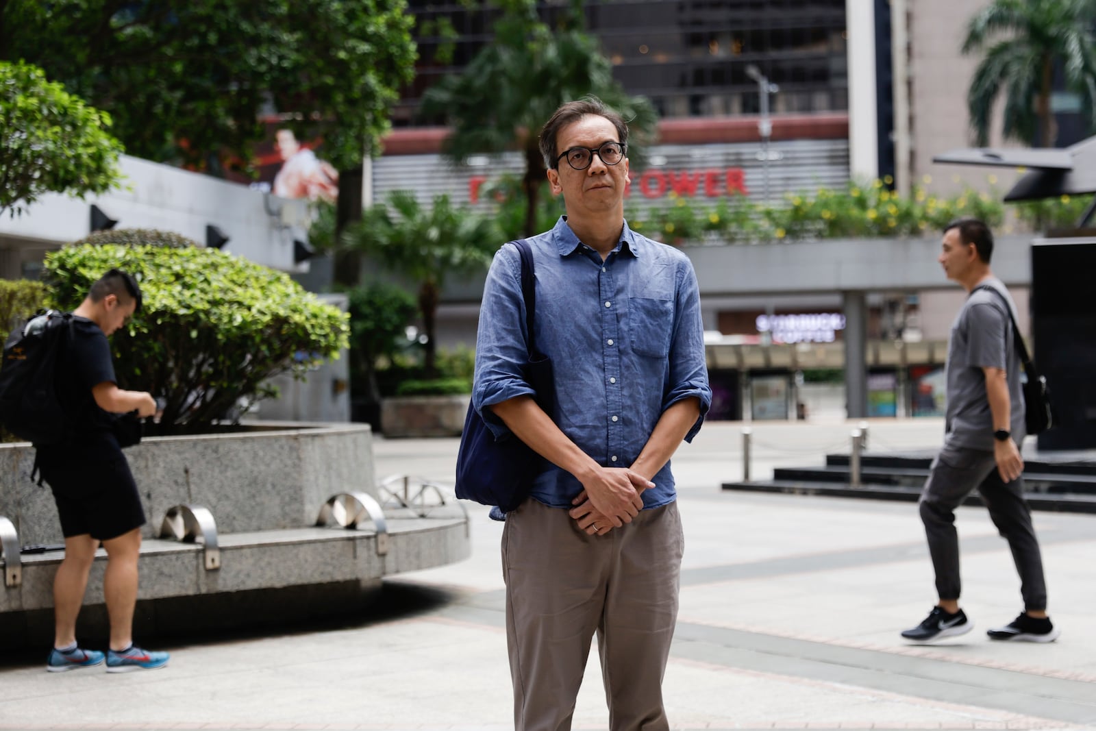 Chung Pui-kuen, the former chief editor of Hong Kong's now shuttered pro-democracy news outlet Stand News, arrives at the Wanchai District Court ahead of the final sentencing of Stand News sedition case in Wan Chai district court in Hong Kong on Thursday, Sept. 26, 2024. (AP Photo/May James)